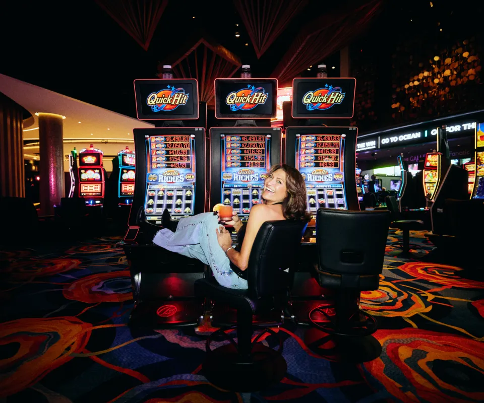 Woman sitting at a slot machine in Ocean Casino Resort